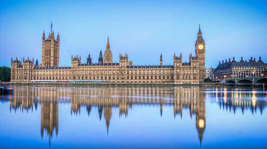 Houses of Parliament and their reflection in the Thames.